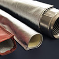 Heat protection for cables and hoses